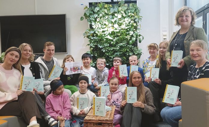 Kirjailija Taija Ruuhijärvi vierailulla Norssin 2B luokan oppilaiden ja opetushenkilökunnan luona.